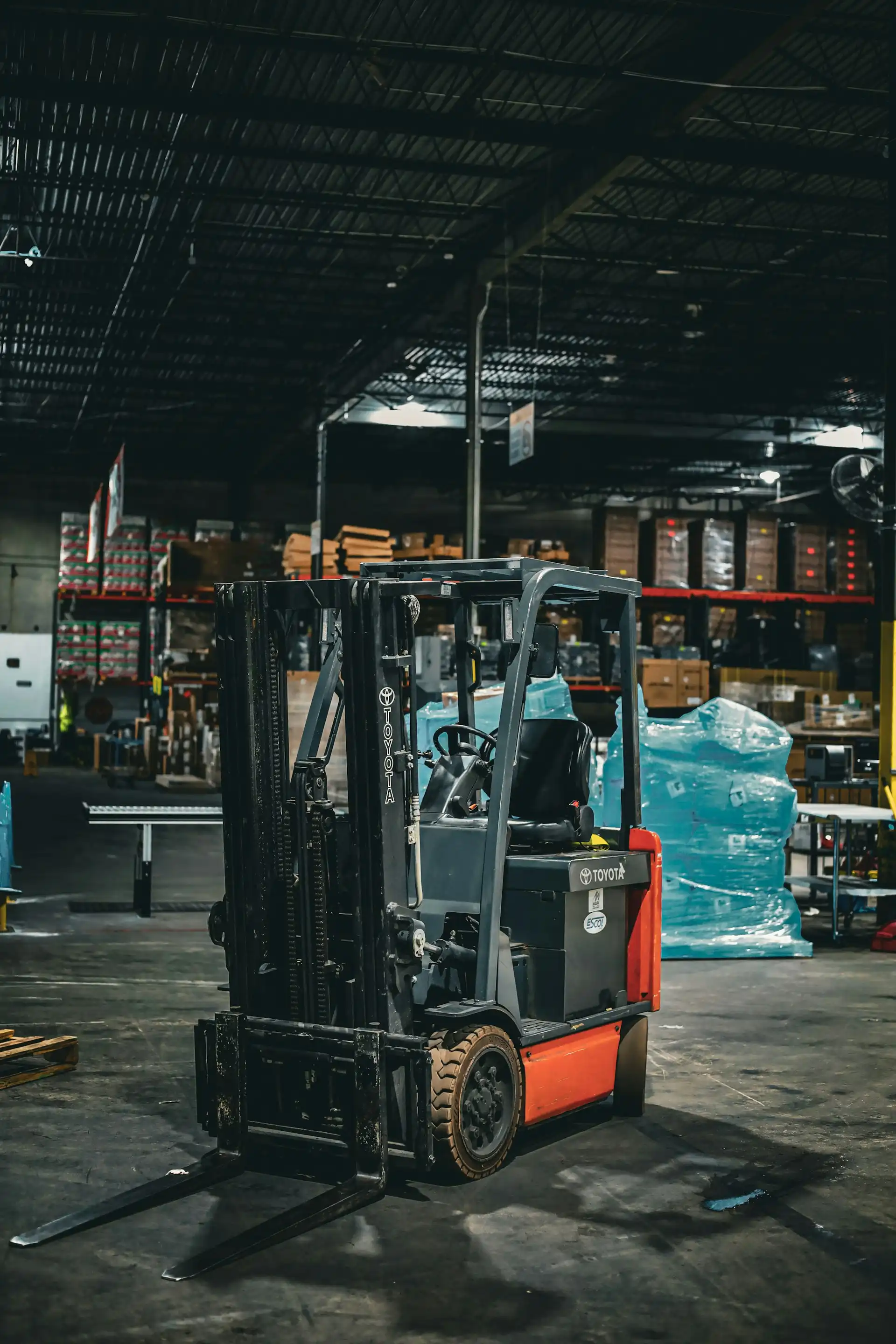 Warehouse team loading cargo into a container during freight execution