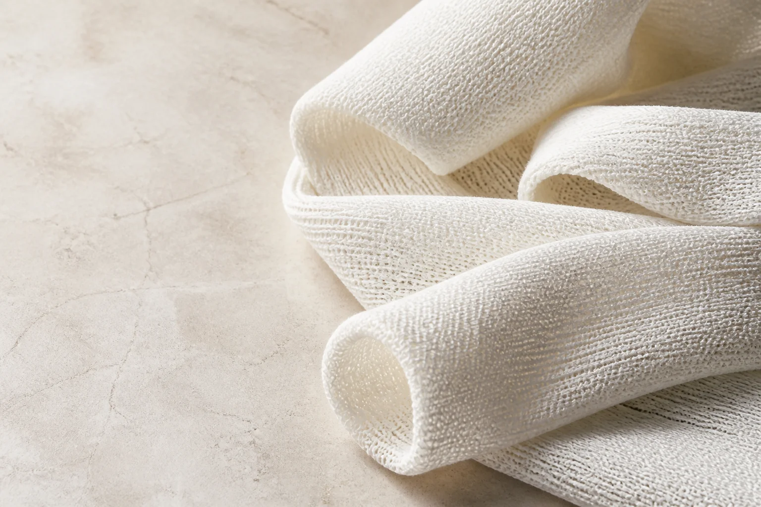 Close-up detail of Stockinette knitted cotton fabric