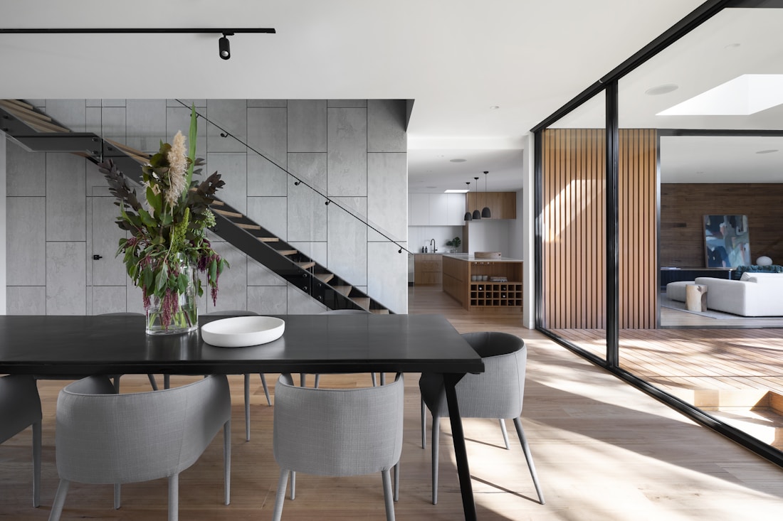 A serene residence opening onto a green garden